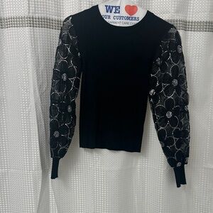 Chic Black Top with Lace Floral Sleeves